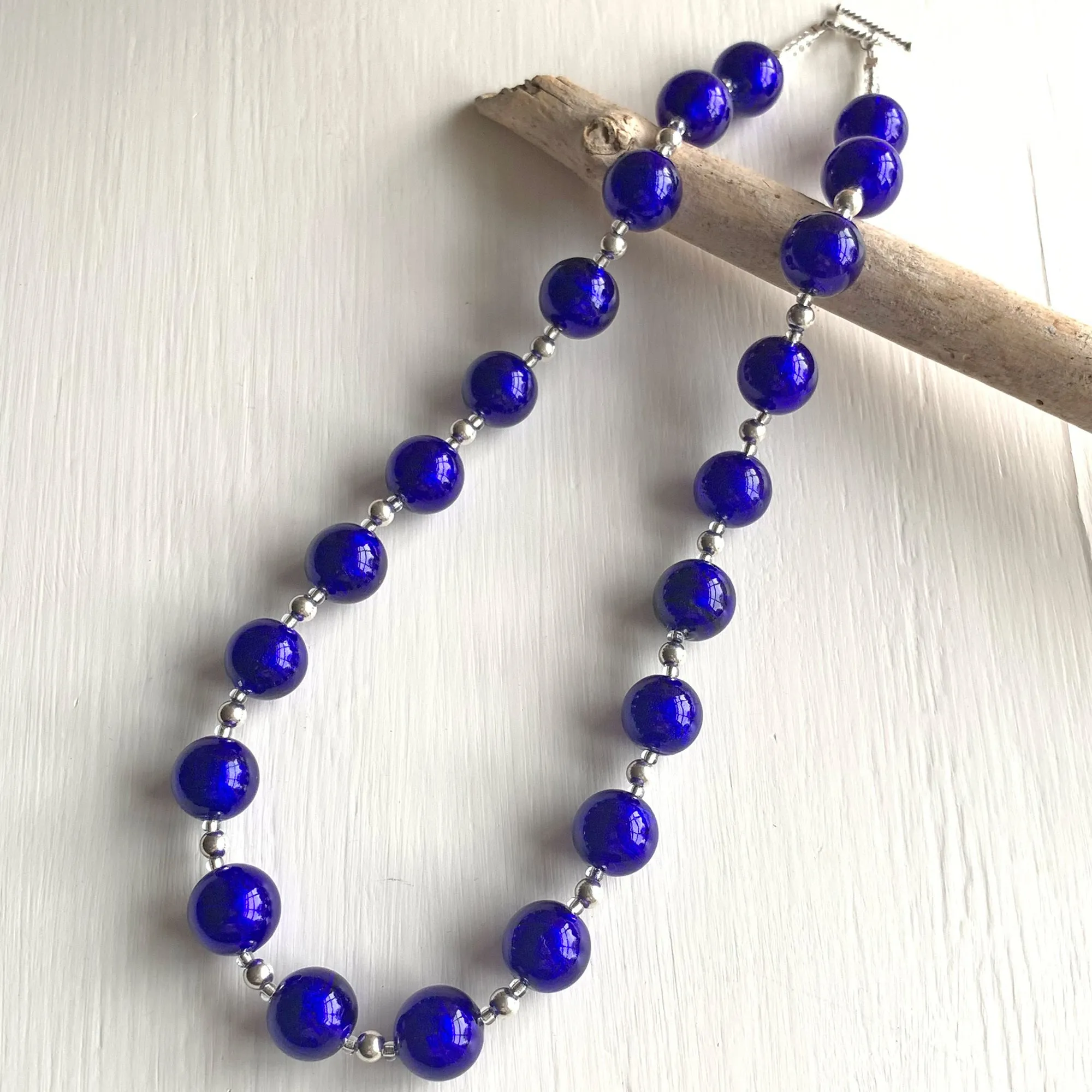 Necklace with dark blue (cobalt) Murano glass small sphere beads on silver